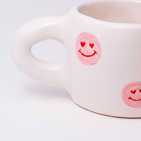 puodelis - rožiniai veidukai