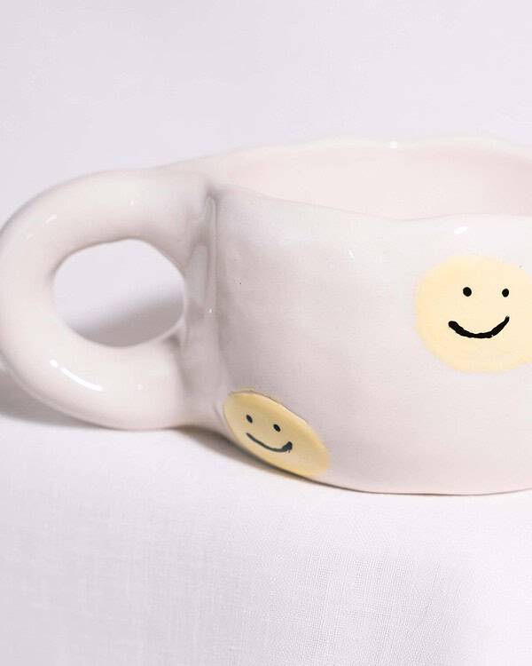 Rankų darbo keramikinis puodelis - smile.