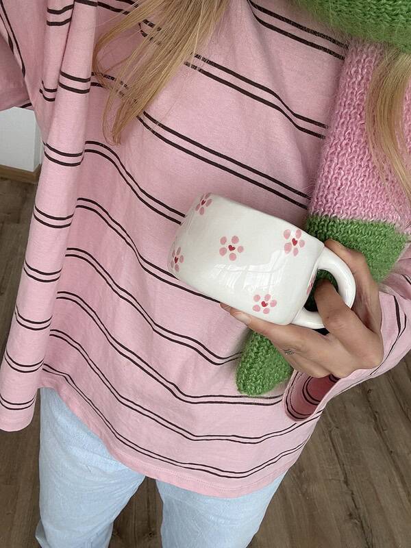 gelyte sirdele keraminis puodelis