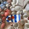 Rankų darbo keraminis puodelis - Dryžuoti mandarinai